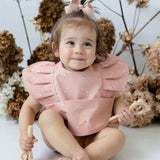 Snuggle Bib Waterproof | Daisy Frill